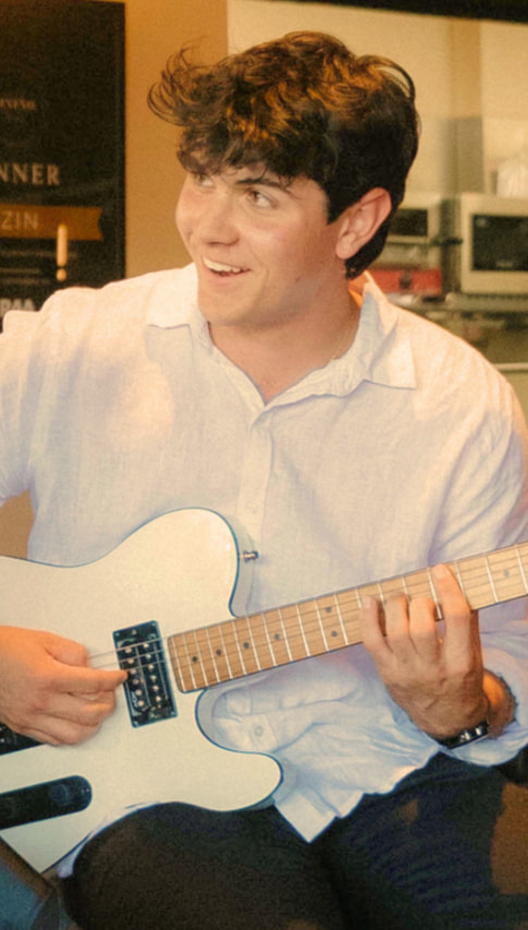 Alex, double bass, bass guitar, electric guitar, acoustic guitar, ableton, music production, and music theory teacher